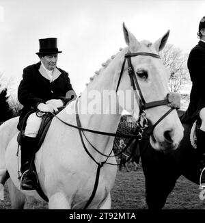Fox Hunting UK. Silk top hats are still worn by some hunt subscribers, who traditionally wear blue coats with buff facings, and are known as the Blue and Buff. Duke of Beaufort Hunt. The annual Boxing Day Meet at Worcester Lodge near Didmarton, Gloucestershire 2002 2000s UK HOMER SYKES Stock Photo