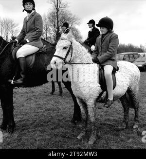 A young rider on an unusual furry horse. It has Equine Cushings Disease. The Duke of Beaufort Hunt the Boxing Day Meet, Worcester Lodge, near Didmarton, Gloucestershire 2002 2000s UK England HOMER SYKES Stock Photo