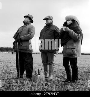 Hare Coursing 2000s UK , Spectators on a bitterly cold February day members of the Swaffham Coursing Club meet near Narborough, Norfolk. UK England 2002 2000s HOMER SYKES Stock Photo