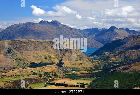 coronet peak to lake wakatipu  and the queenstown area and mountain peaks,  on the south island of new zealand Stock Photo