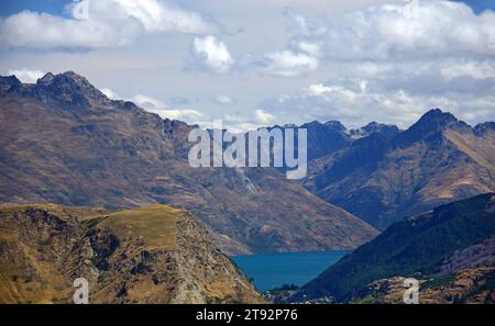 coronet peak to lake wakatipu  and the queenstown area and mountain peaks,  on the south island of new zealand Stock Photo
