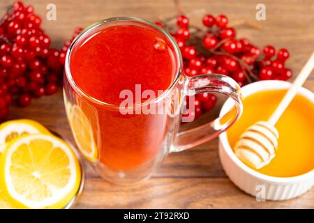 Vitamin berry viburnum tea with honey and lemon Stock Photo