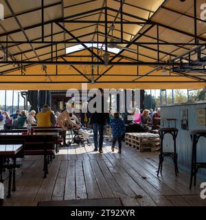 Belgrade, Serbia, Nov 12, 2023: A restaurant terrace placed on a deck of river barge anchored on the Danube Stock Photo