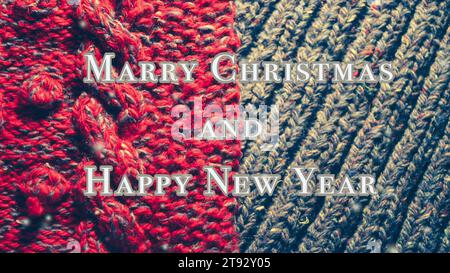 Merry Christmas and Happy New Year words letters design white gray. Knitted red blue surface. Falling snow snowflakes snowfall. Cosiness coziness cozy. Text background backdrop. Stock Photo