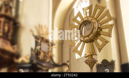 A monstrance containing the consecrated host, which is Our Lord Jesus Christ. Corpus Christi - 3D Illustration Stock Photo