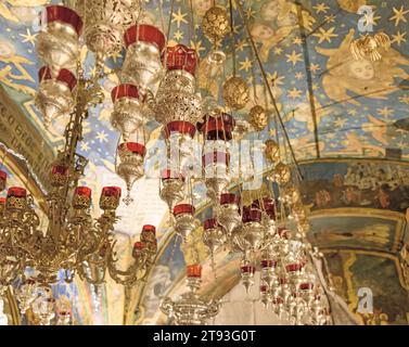 Lamps over Golgotha in the Church of the Holy sepulchre. Jerusalem. Israel Stock Photo