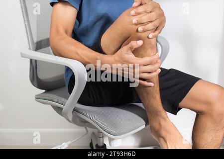 Man having leg muscle pain Stock Photo