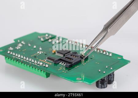 Detail of working on circuit board in laboratory Stock Photo