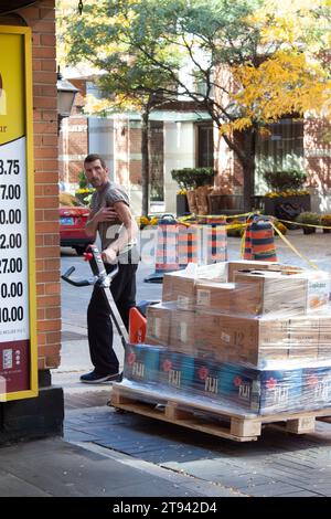 Man moving boxes Stock Photo