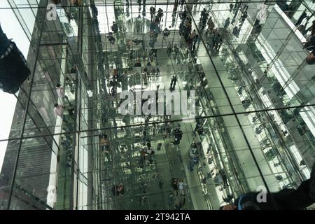 New York city, NY; November 11,2022- SUMMIT One Vanderbilt, super wide view panorama interior endless glass mirrors reflecting tourists multiple level Stock Photo