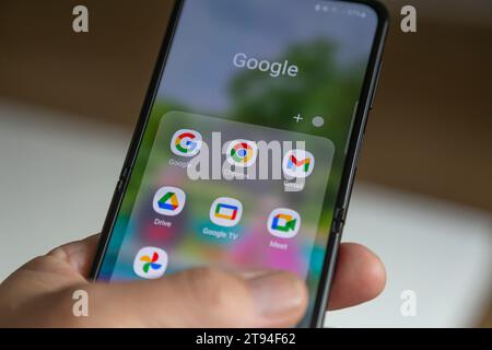 Nijkerk, Gelderland, Netherlands, September 9, 2023: Close-up of a hand holding a smartphone with Google Services app on the screen. Stock Photo