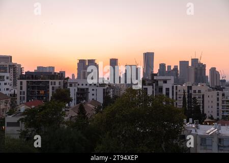 Tel Aviv, Israel - October 6, 2023 - Aerial view of Tel Aviv in the sunset. Skysrapers and streets seen from the financial district of the city. Stock Photo