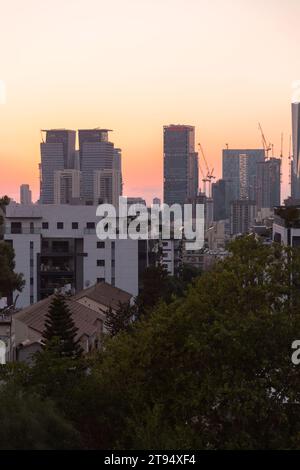 Tel Aviv, Israel - October 6, 2023 - Aerial view of Tel Aviv in the sunset. Skysrapers and streets seen from the financial district of the city. Stock Photo