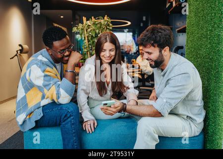 Business team working together on a new project, utilizing their expertise and problem-solving skills to ensure the success of their small company. Stock Photo