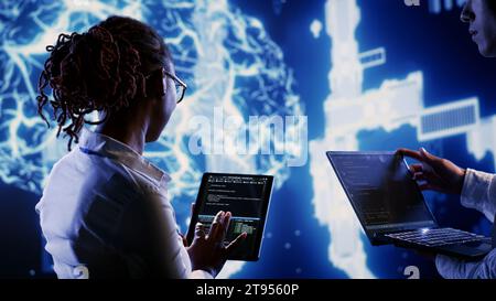 Computer scientist developing artificial intelligence neural networks ...