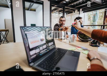 Successful Business Team Collaborating on Project Management Stock Photo