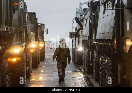 Hanko, Finland. 31st Oct, 2023. U.S. Marine Corps 2nd Lt. Gerard Maurer, a logistics officer, with Combat Logistics Battalion 6, Combat Logistics Regiment 2, 2nd Marine Logistics Group, inspects convoy readiness during an offload leading up to exercise Freezing Winds 23 (FW23) at Hanko, Finland, Oct. 31, 2023. FW23 is a Finnish-led maritime exercise in which United States Marines assigned to Marine Rotational Force- Europe, and U.S. Navy Forces Europe take part. The exercise serves as a venue to increase Finnish Navy readiness and increase U.S., Finland, and NATO partners and Allies intero Stock Photo