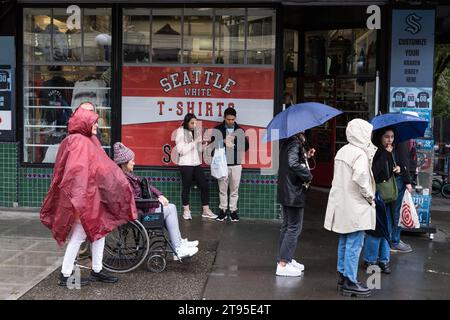 Seattle, USA. 25th Sep, 2023. Tourists by Pike Place Market. Stock Photo