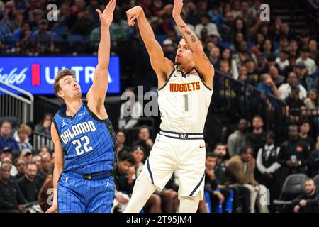 Orlando, Florida, USA, November 22, 2023, Denver Nuggets forward Michael Porter Jr #1 shoots a three at the Amway Center. (Photo Credit: Marty Jean-Louis/Alamy Live News Stock Photo