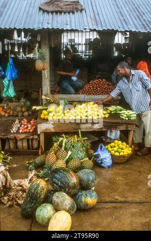 Stallholder at the Darajani Market, the main market in Stone Town, Zanzibar, East Africa Stock Photo