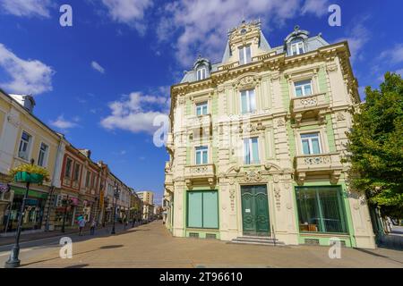 Ruse, Bulgaria - September 17, 2023: View of the Aleksandrovska street, with old buildings, locals, and visitors, in Ruse, northeastern Bulgaria Stock Photo