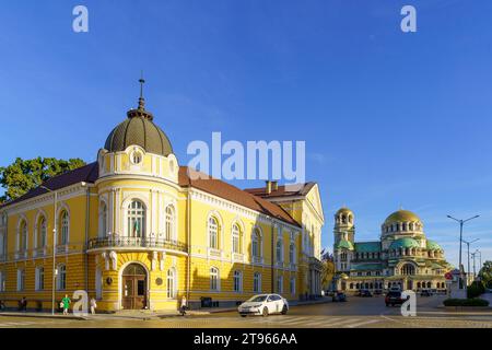 Sofia, Bulgaria - October 09, 2023: Street view with various buildings, St. Alexander Nevsky Cathedral, locals, and visitors, in Sofia, Bulgaria Stock Photo