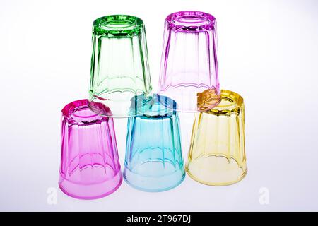 Colorful drinking glasses on white background Stock Photo