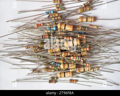 Heap of resistance. Resistor stack. Electrical components. Carbon film resistors. Stock Photo