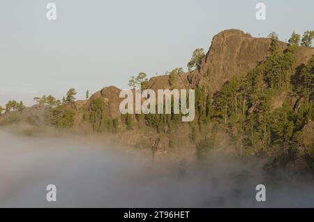 Morro del Visadero cliff and sea of clouds. Integral Natural Reserve of Inagua. Gran Canaria. Tejeda. Canary Islands. Spain. Stock Photo