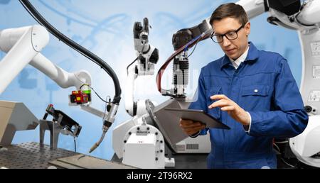 robots in a smart factory. Smart industry 4.0 concept. Stock Photo