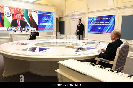 Moscow, Russia. 21st Nov, 2023. Russian President Vladimir Putin, right, takes part in a an extraordinary BRICS summit on the Palestinian-Israeli conflict via video link from the Kremlin, November 21, 2023 in Moscow, Russia. Credit: Mikhail Klimentyev/Kremlin Pool/Alamy Live News Stock Photo