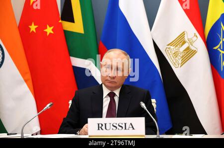 Moscow, Russia. 21st Nov, 2023. Russian President Vladimir Putin, right, takes part in a an extraordinary BRICS summit on the Palestinian-Israeli conflict via video link from the Kremlin, November 21, 2023 in Moscow, Russia. Credit: Mikhail Klimentyev/Kremlin Pool/Alamy Live News Stock Photo