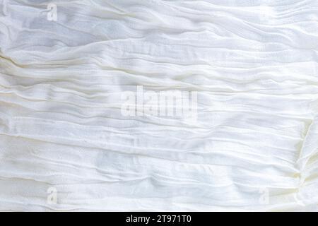 white crumpled bed sheet, texture, background Stock Photo