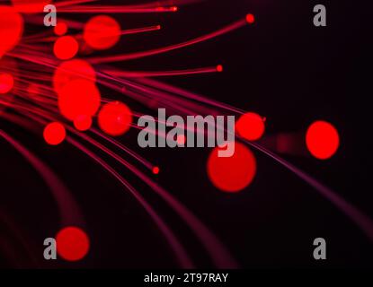 Red glowing fiber optic cables Stock Photo