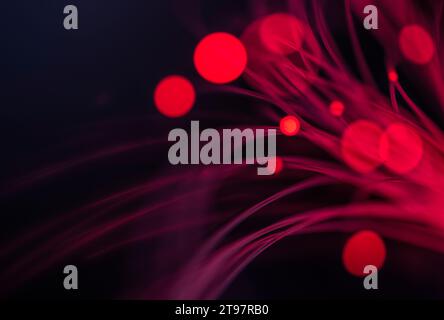 Red glowing fiber optic cables Stock Photo
