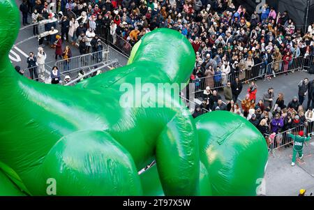 New York, United States. 23rd Nov, 2023. The Sinclair Oil Baby Dino balloon passes by on Sixth Avenue during the Macy's Thanksgiving Day Parade 2023 in New York City on Thursday, November 23, 2023. Photo by John Angelillo/UPI Credit: UPI/Alamy Live News Stock Photo