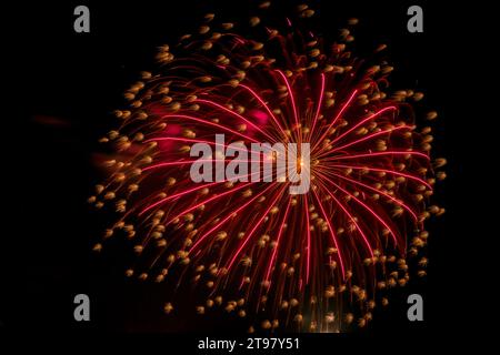 Fireworks On The Background Of The Dark Night Sky in Dalmine (BG),Italy, show for New Year's eve Stock Photo