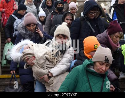 Lviv, Ukraine - March 8, 2022: Refugees coming on railway station of western Ukrainian city of Lviv Stock Photo