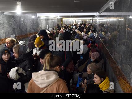 Lviv, Ukraine - March 8, 2022: Refugees near railway station of Lviv waiting for the train to Poland. Stock Photo