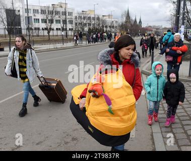 Lviv, Ukraine - March 6, 2022: Refugees near main railway station of Lviv. Stock Photo