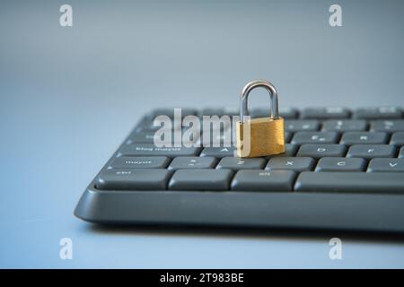 The image symbolizes the concept of securing digital information, the protection of sensitive data from unauthorized access. This image is ideal for c Stock Photo