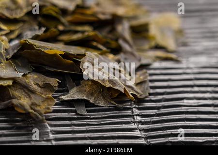 Japanese dried kombu seaweeds. Dehydrated Asian seafood ingredient. Stock Photo