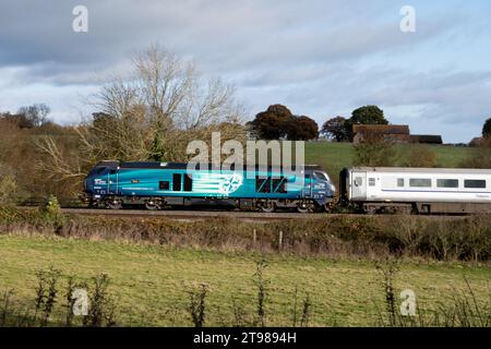 Direct Rail Services class 68 diesel locomotive No. 68009 'Titan' pulling a Chiltern Railways train, Warwickshire, UK Stock Photo