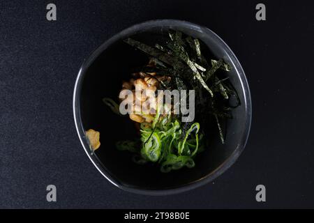 Natto japanese appetizer food isolated in black background Stock Photo