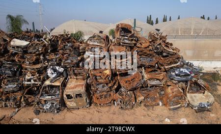 Some of the hundreds of Israeli vehicles stacked in a lot outside Netivot, southern Israel, near the border with the Gaza Strip as seen in an aerial photograph on November 23, 2023. These vehicles and hundreds of others were destroyed during the October 7, 2023 Hamas terrorist infiltrations and murders in which 1,200 Israelis were killed and some 240 people taken hostage back into Gaza. On November 24 Israel and Hamas are due to begin a ceasefire and exchange 50 Israeli hostages for 150 Palestinians prisoners held in Israel. The ceasefire is due to last five days with about 12 hostages being r Stock Photo