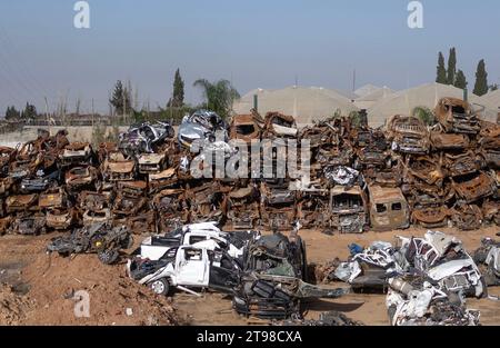 Hundreds of Israeli vehicles are stacked in a lot outside Netivot, southern Israel, near the border with the Gaza Strip as seen in an aerial photograph on November 23, 2023. These vehicles and hundreds of others were destroyed during the October 7, 2023 Hamas terrorist infiltrations and murders in which 1,200 Israelis were killed and some 240 people taken hostage back into Gaza. On November 24 Israel and Hamas are due to begin a ceasefire and exchange 50 Israeli hostages for 150 Palestinians prisoners held in Israel. The ceasefire is due to last five days with about 12 hostages being released Stock Photo