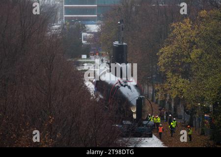 Gdynia, Poland. 23 November 2023. Decommissioned Polish Kobben-class submarine ORP Sokol 294, former Norwegian HNoMS Stord (S-308), is transported to the Naval Museum to be an open-air exposition © Wojciech Strozyk / Alamy Live News Stock Photo