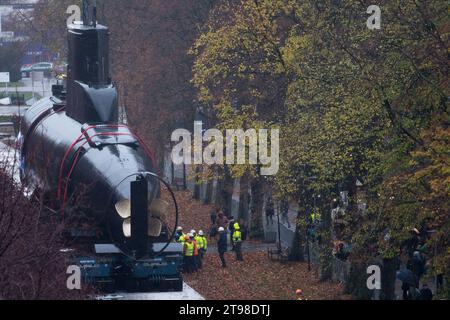 Gdynia, Poland. 23 November 2023. Decommissioned Polish Kobben-class submarine ORP Sokol 294, former Norwegian HNoMS Stord (S-308), is transported to the Naval Museum to be an open-air exposition © Wojciech Strozyk / Alamy Live News Stock Photo