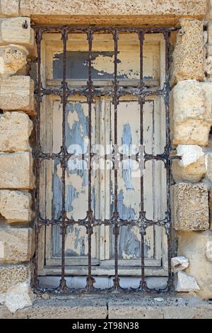 old window with metal bars, closeup Stock Photo