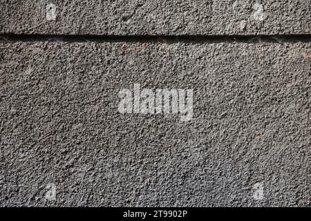 Plastered wall texture with rough relief mortar and light gray color close up Stock Photo